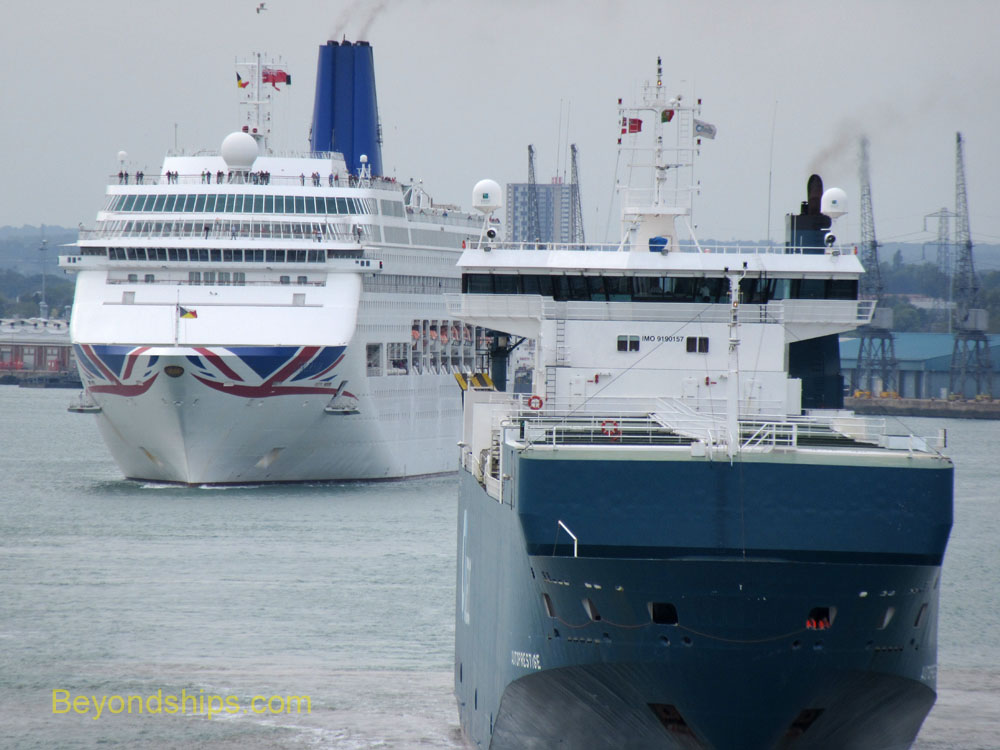 Oriana cruise ship with cargo ship