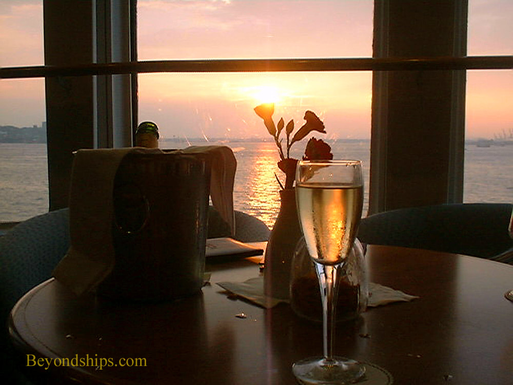 Champagne at sunset on QE2