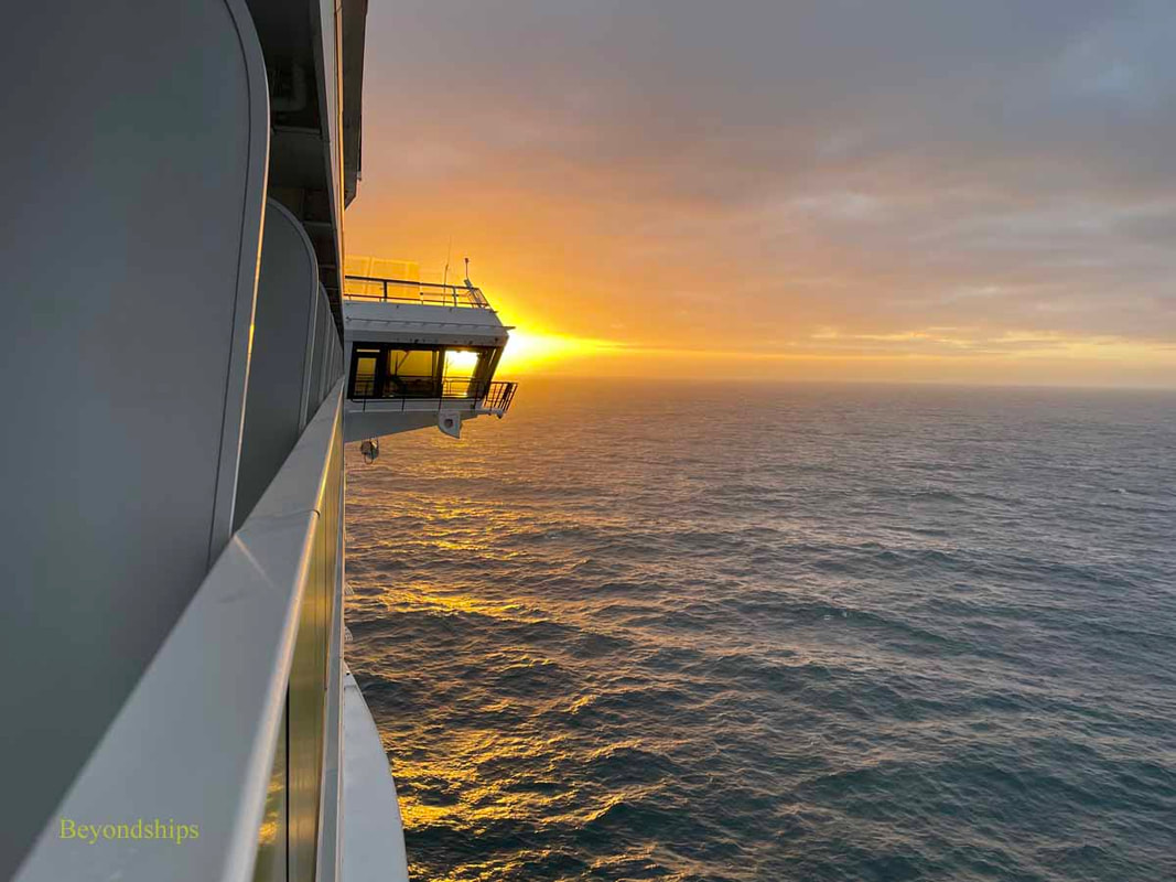 Cruise ship Anthem of the Seas sailing into sunrise