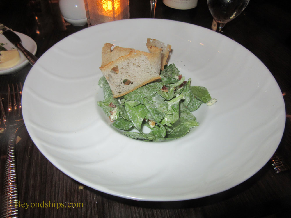 Spinach salad at Fahrenheit 555 steakhouse on cruise ship Carnival Horizon